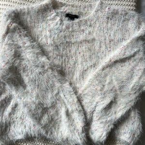 Fuzzy sweater with rainbow coloring